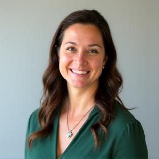 Portrait of a friendly female massage therapist
